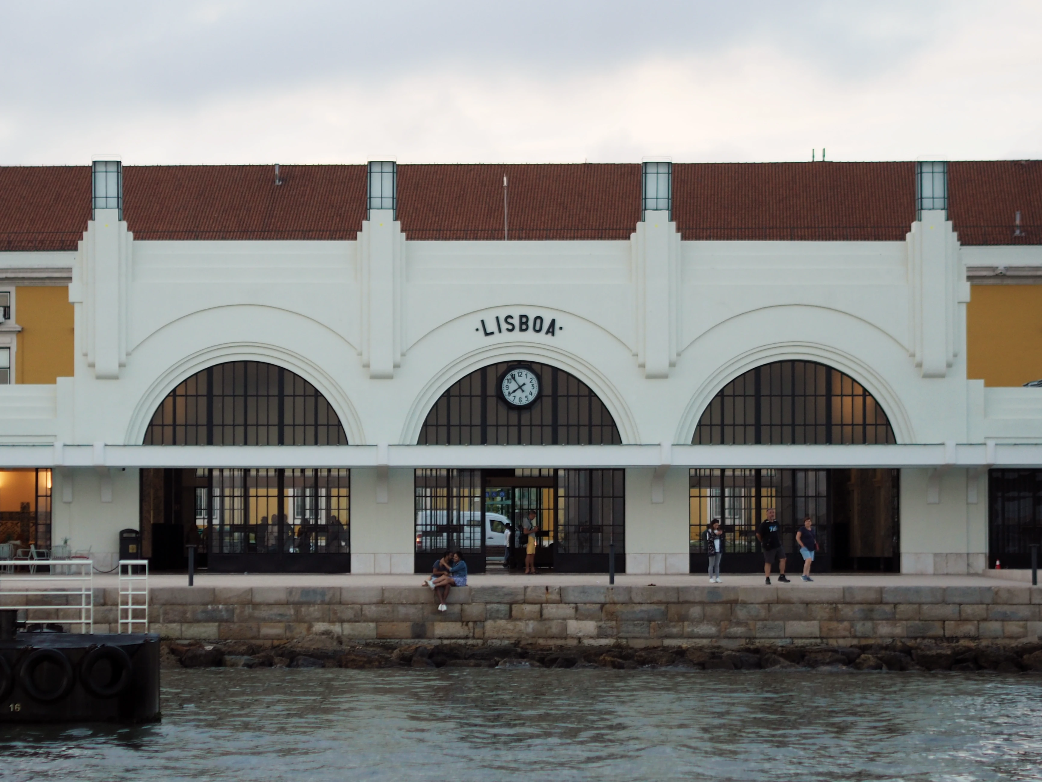 An old terminal in the Lisbon harbour, seen from the water.